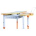 Mobile table with adjustable height and tilt of the table top, with a shelf